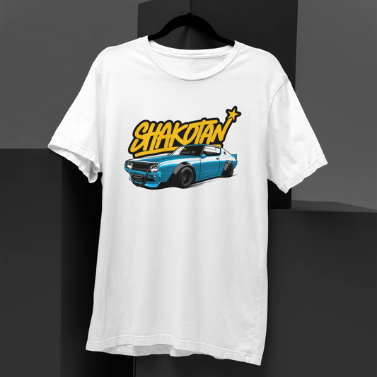 White t-shirt with a graphic design of a car and 'Shakotan' text on a black background