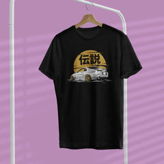 Black t-shirt with car graphic and Japanese text on a hanger against a purple background