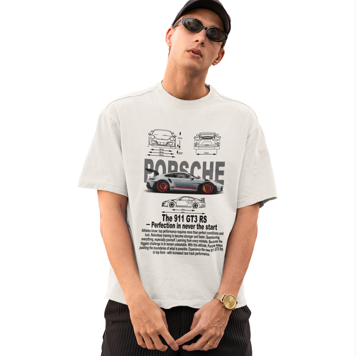 Person wearing a white t-shirt with Porsche graphics and text on a white background