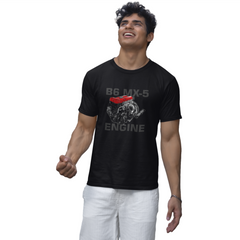 Man wearing a black t-shirt with a graphic design on a white background