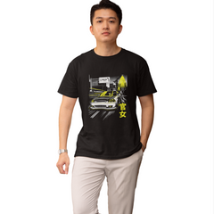 Person wearing a black t-shirt with a graphic design on a white background