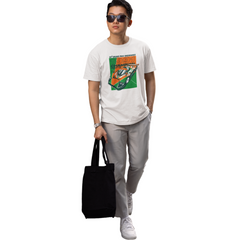 Person wearing a graphic t-shirt and holding a black tote bag on a white background