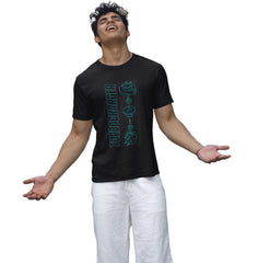 Man wearing a black t-shirt with green graphics on a white background