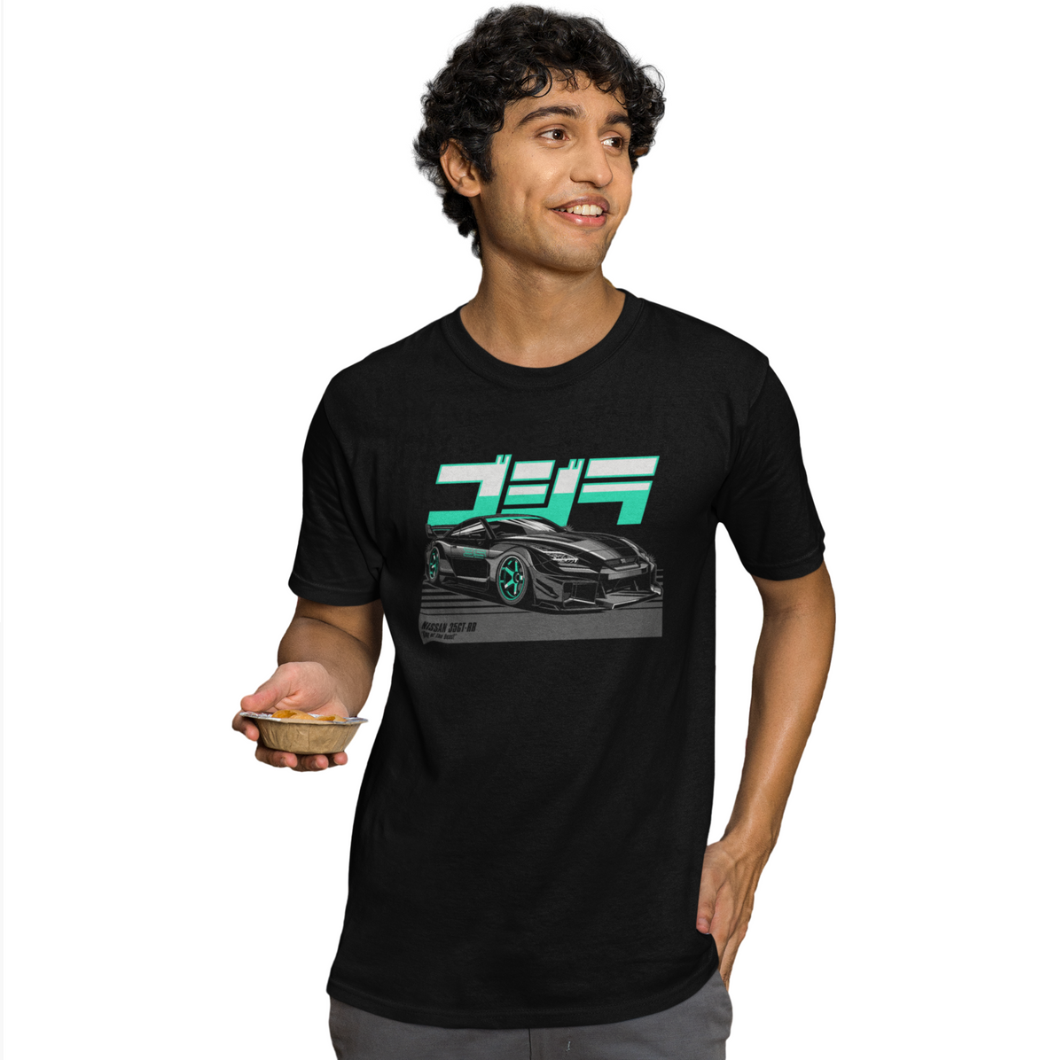 Person wearing a black t-shirt with a car graphic and text on a white background