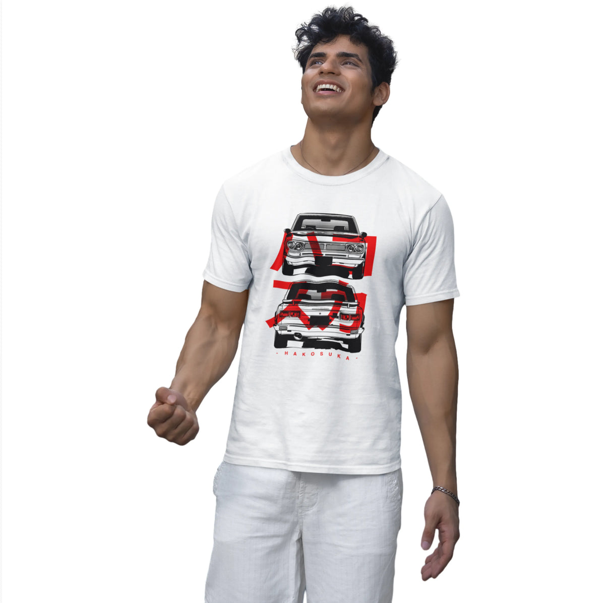 Man wearing a white t-shirt with car graphic design on a white background