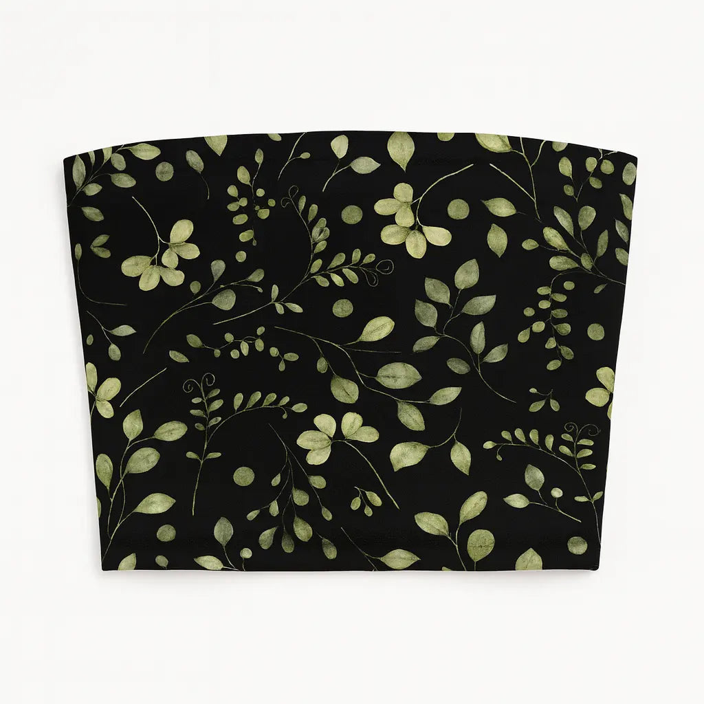 Fabric with green leaf pattern on a black background