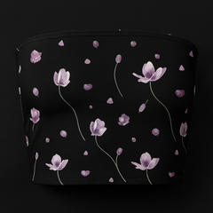 Black pouch with pink floral pattern on a black background
