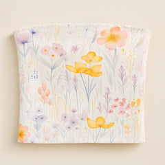 Floral-patterned fabric with colorful flowers on a beige background