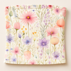 Floral patterned fabric with pink, purple, and orange flowers on a white background