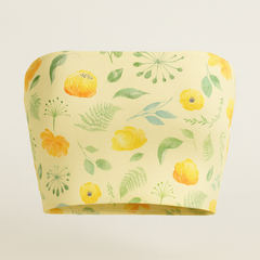 Yellow bandeau top with floral pattern on a light gray background