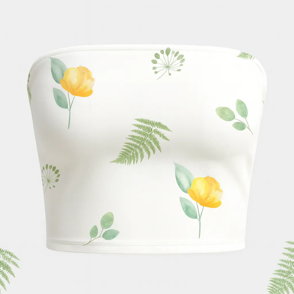 White strapless top with yellow floral and green leaf patterns on a white background