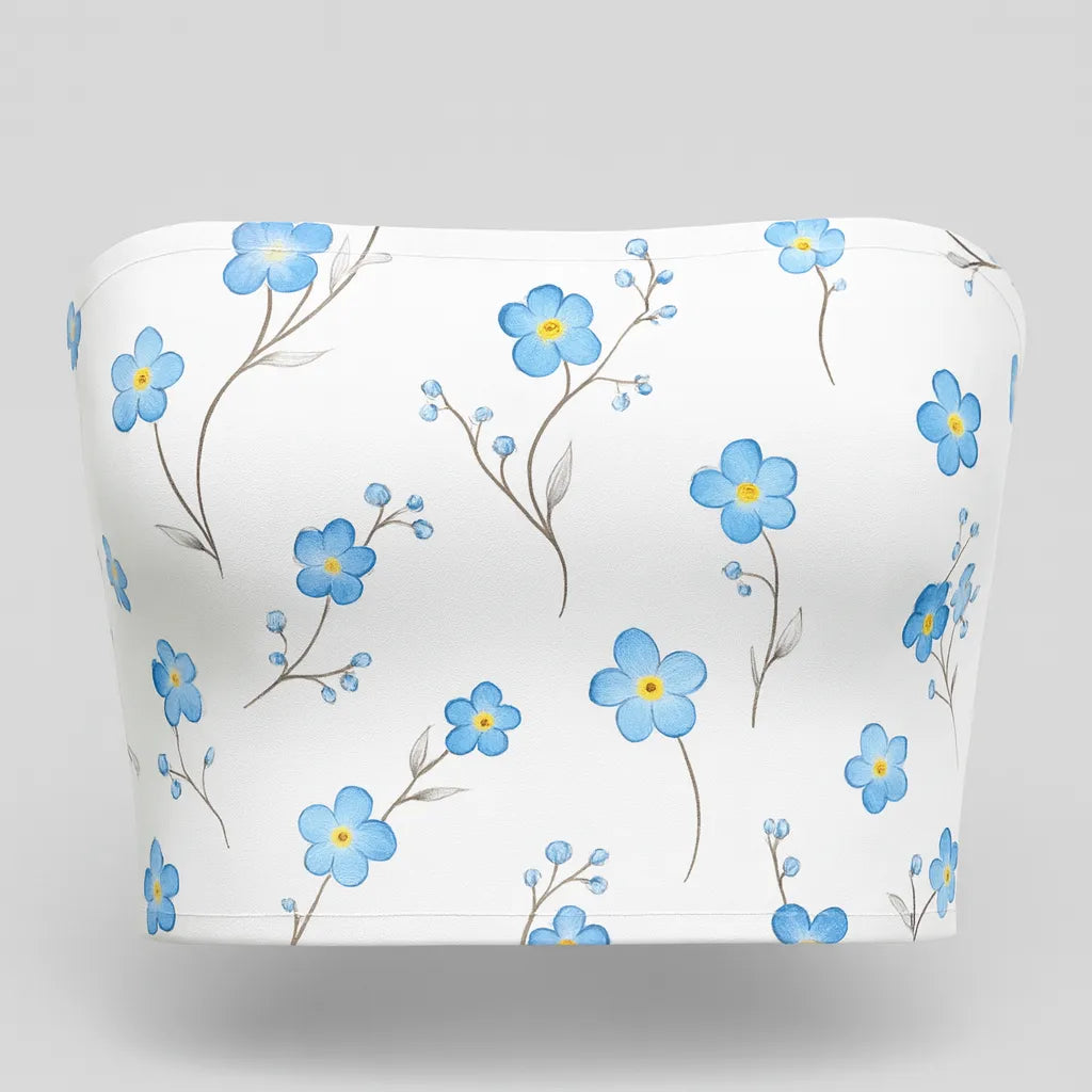 White strapless top with blue floral pattern on a white background