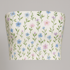 Floral-patterned tube top on a gray background