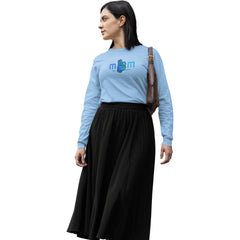 Woman wearing a light blue sweater with a logo and a black skirt on a white background
