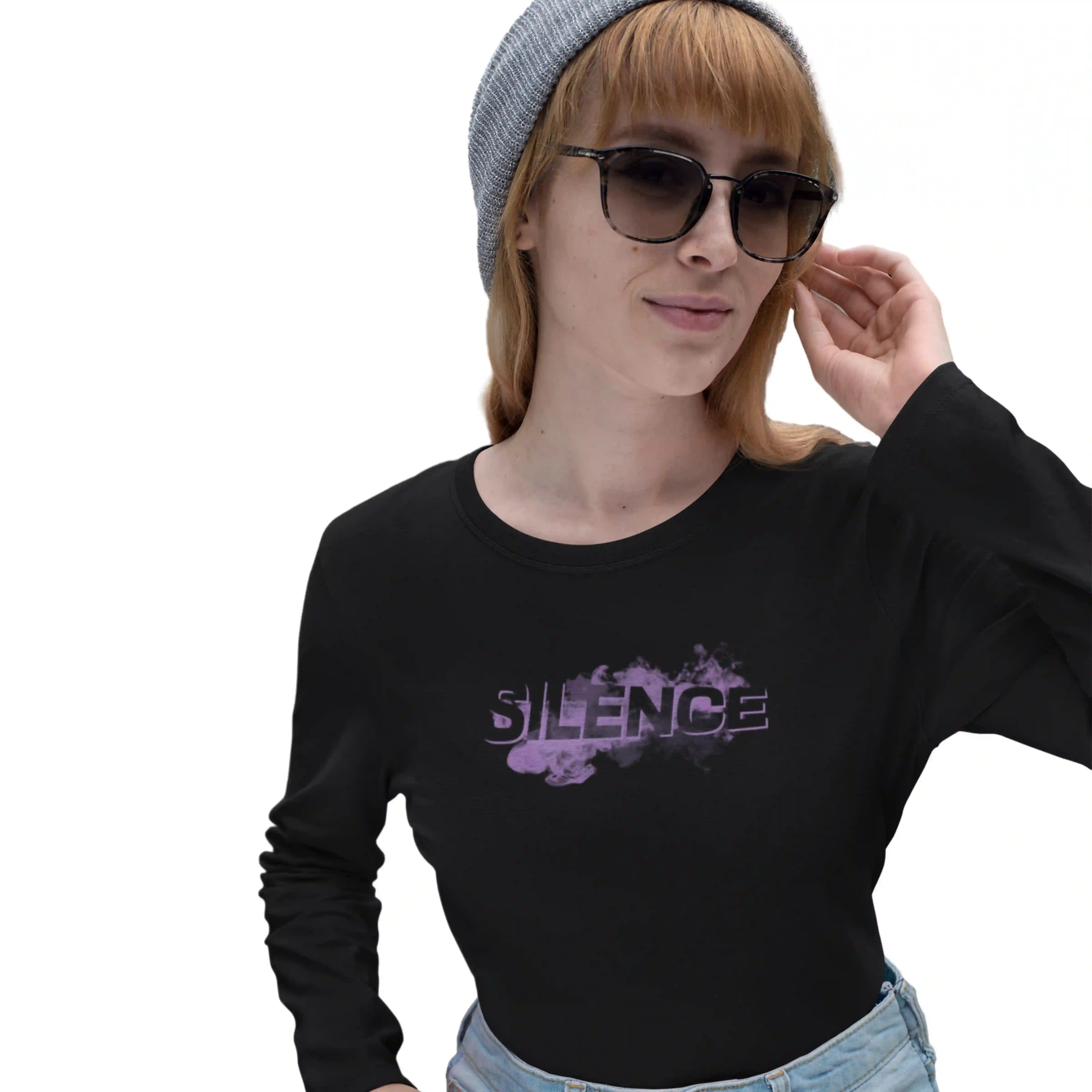 Person wearing a black long-sleeve shirt with 'SILENCE' design on a white background