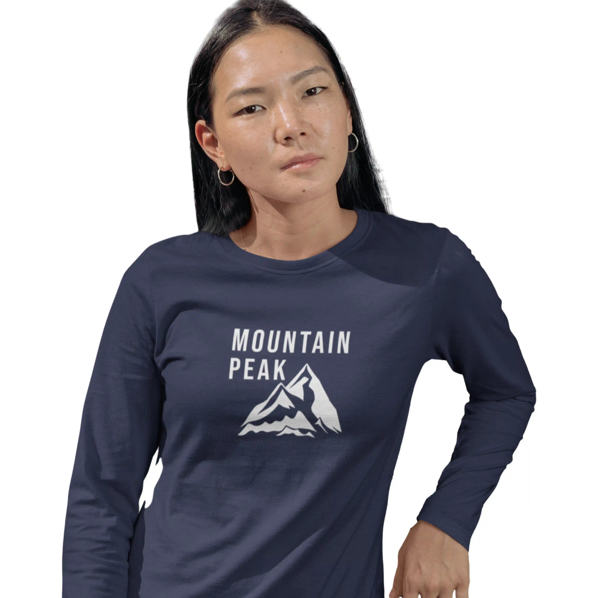 Person wearing a navy blue 'Mountain Peak' long-sleeve shirt on a white background