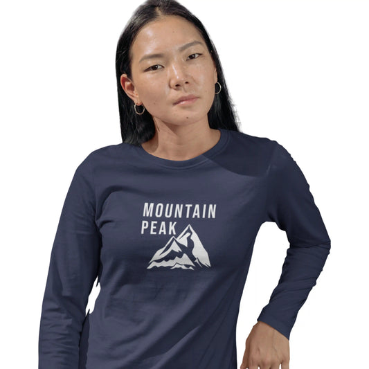 Person wearing a navy blue 'Mountain Peak' long-sleeve shirt on a white background