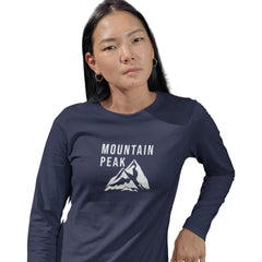 Person wearing a navy blue 'Mountain Peak' long-sleeve shirt on a white background