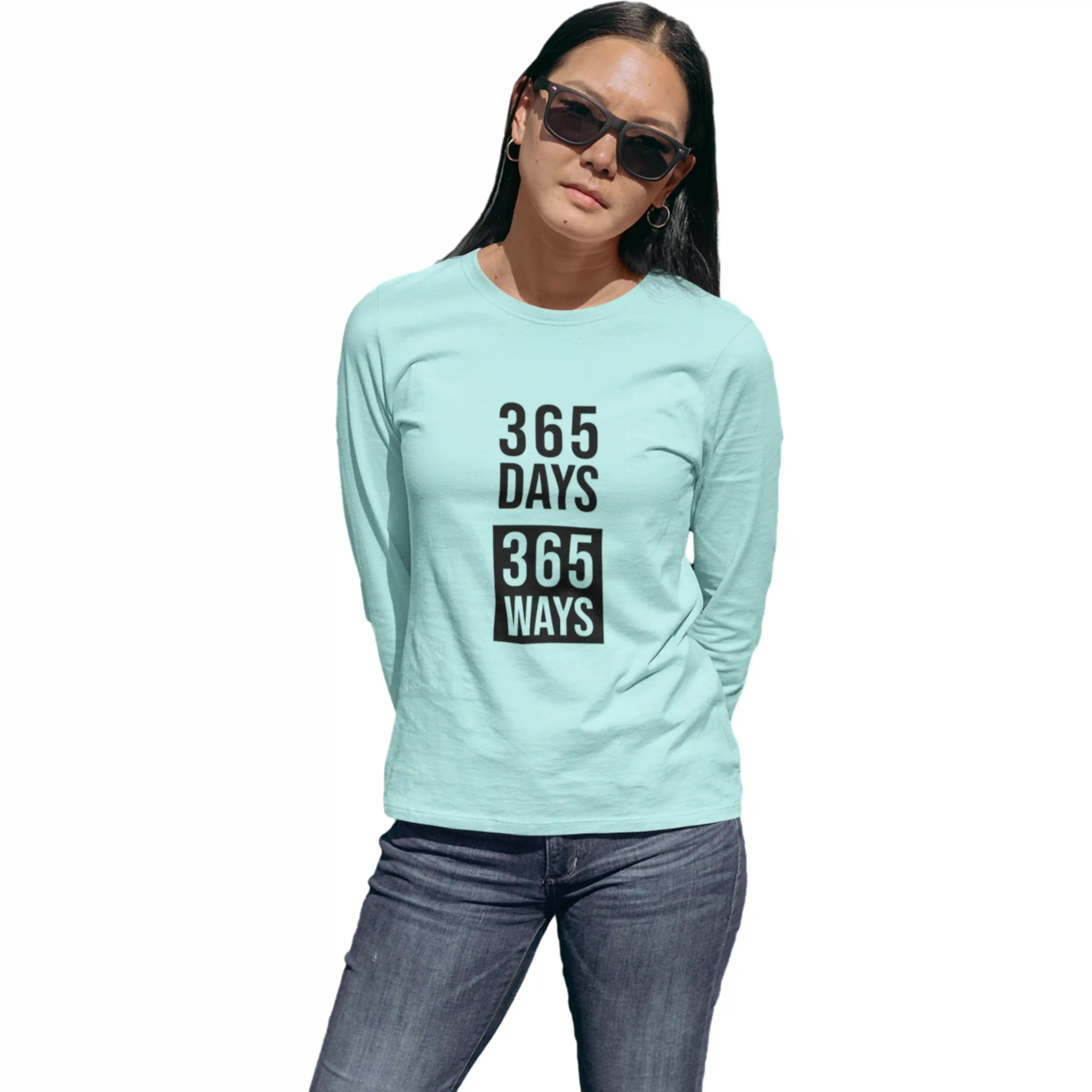 Person wearing a light blue long-sleeve shirt with text on a white background