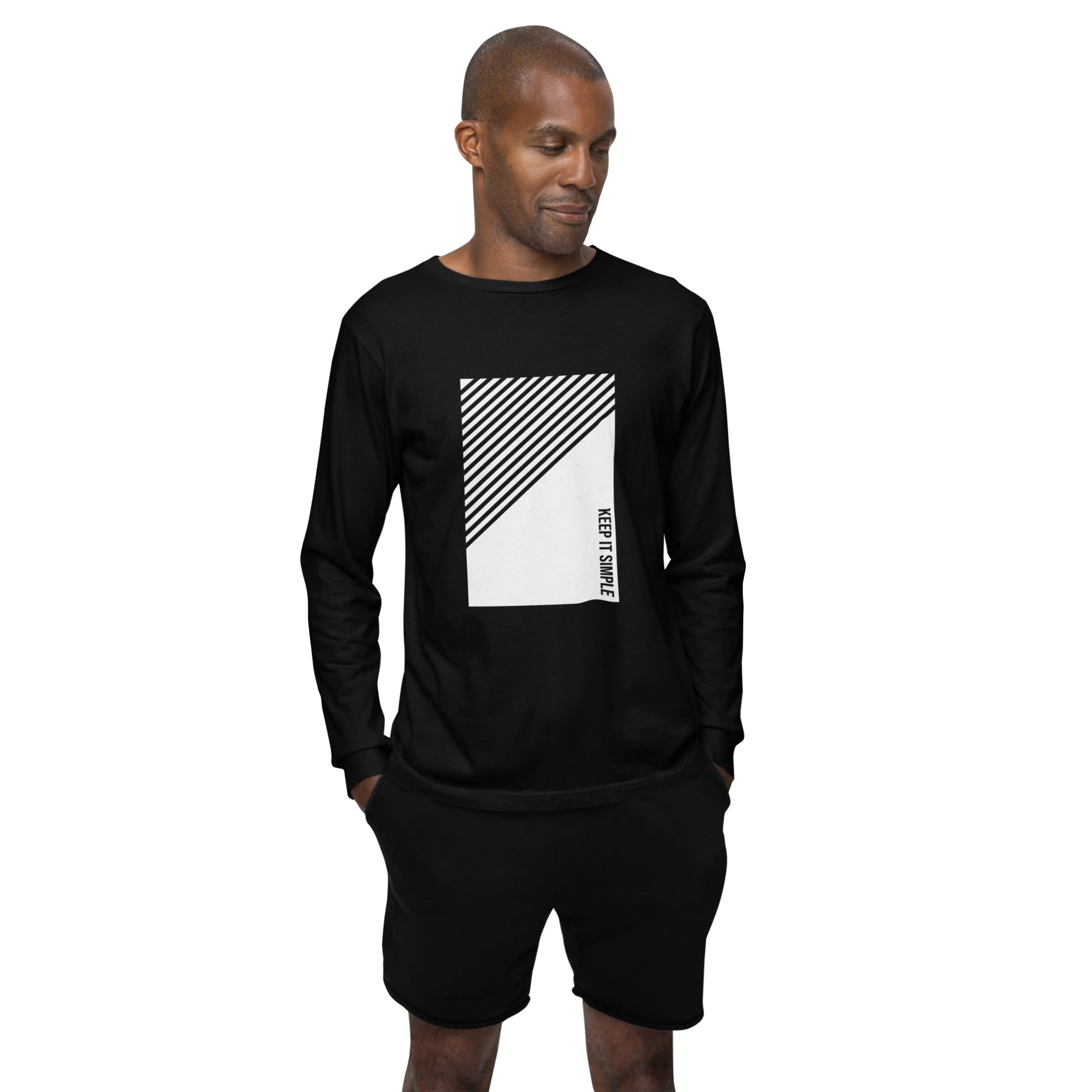 Man wearing a black long-sleeve shirt with a white graphic design on a white background