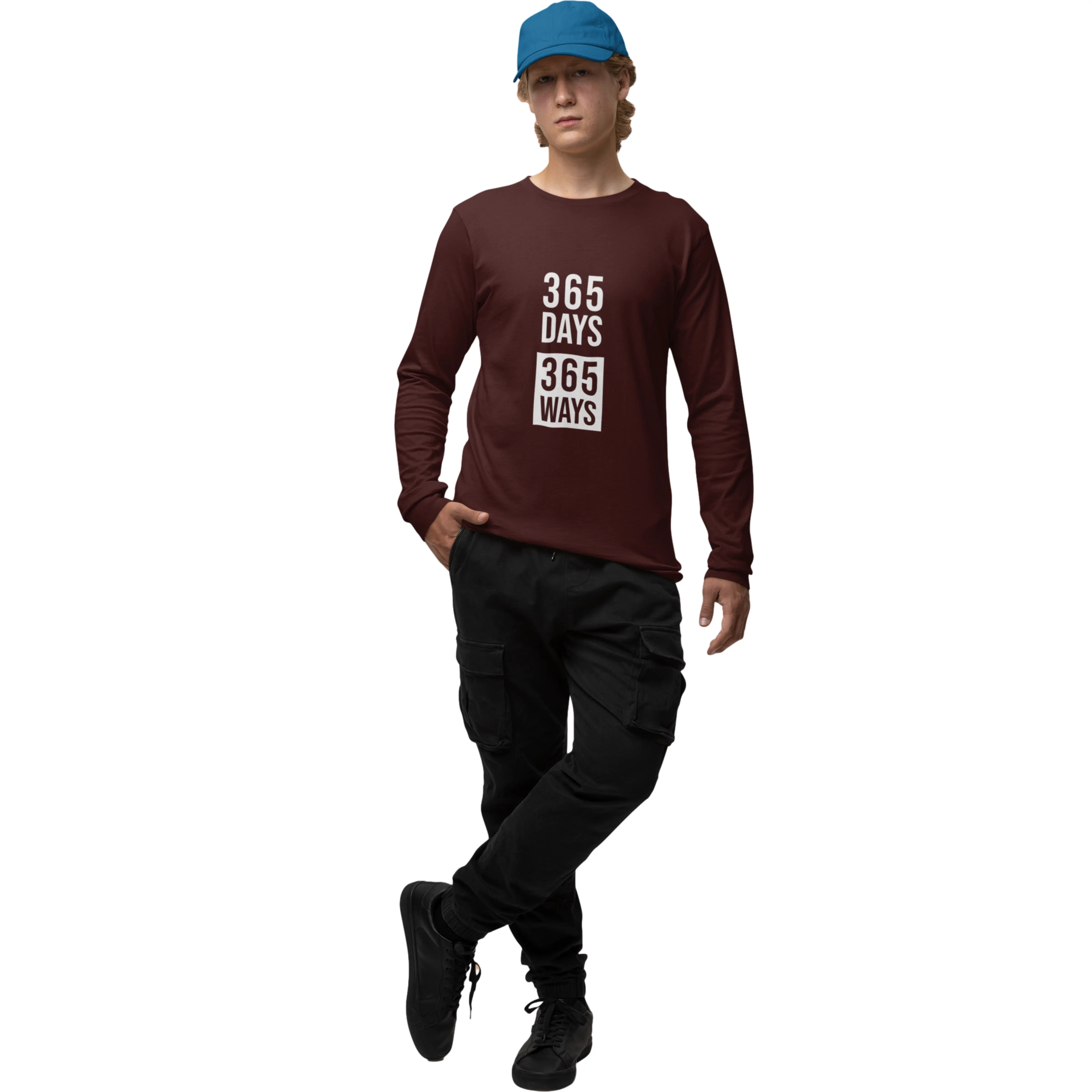 Person wearing a maroon long-sleeve shirt with text and black pants on a white background