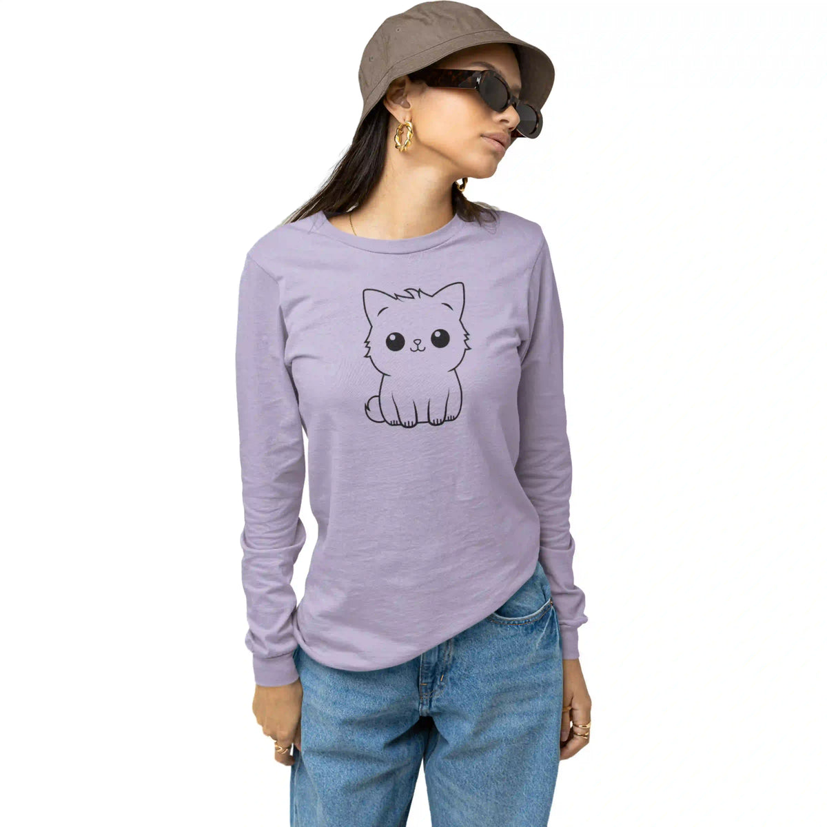 Woman wearing a purple long-sleeve shirt with a cat graphic, blue jeans, and a brown hat on a white background