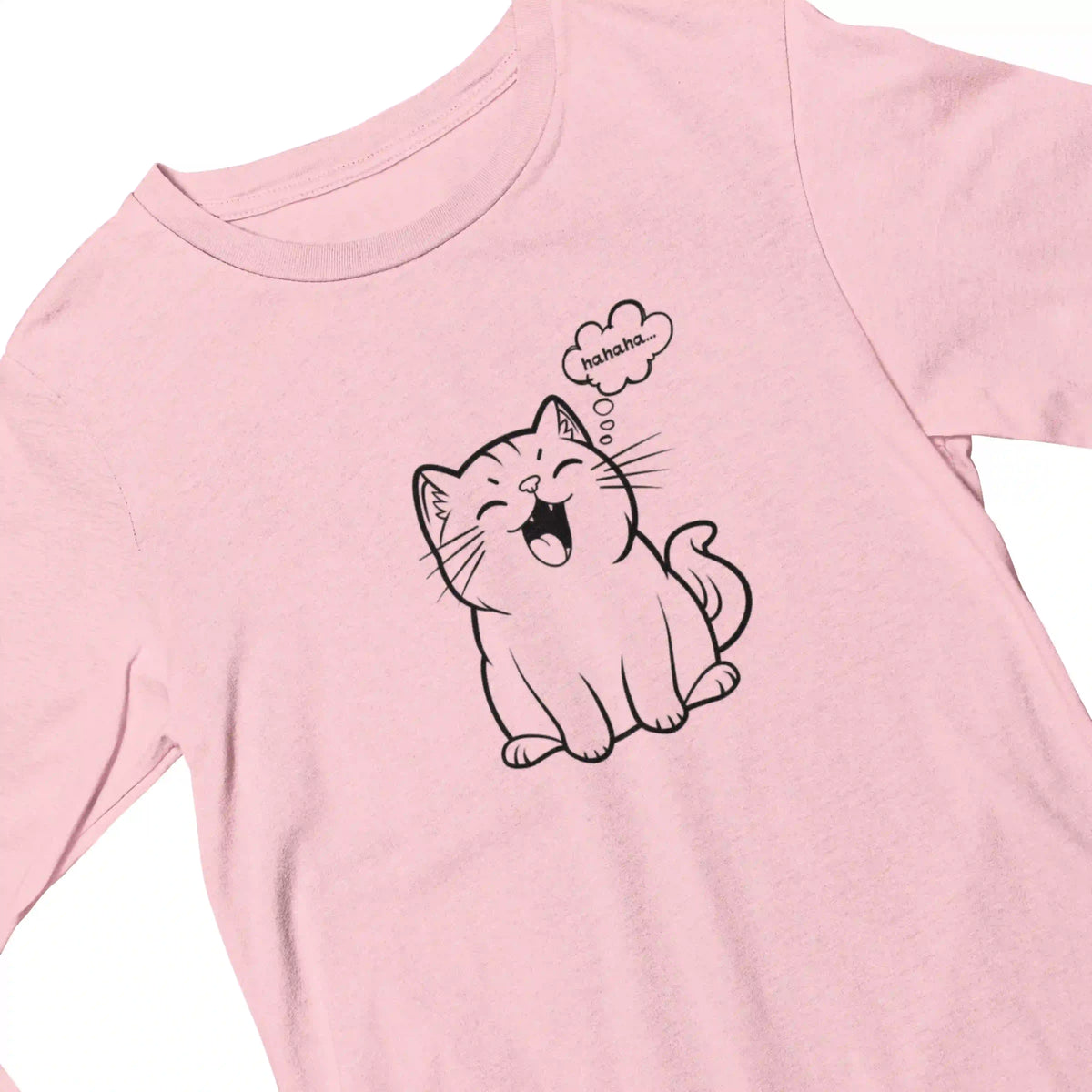 Pink t-shirt with a black line drawing of a cat and speech bubble on a white background