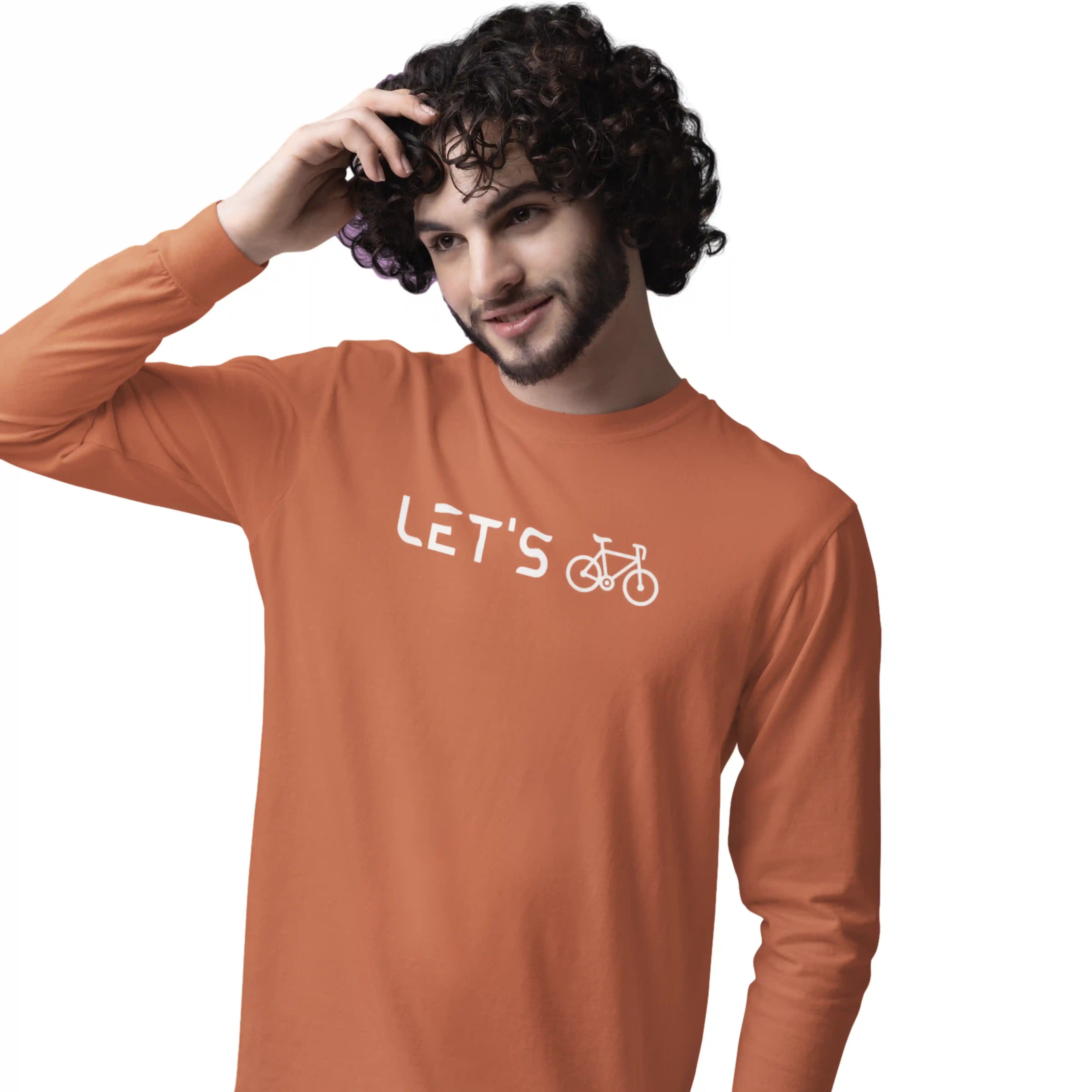 Man wearing an orange long-sleeve shirt with 'LET'S' and a bicycle graphic on a white background