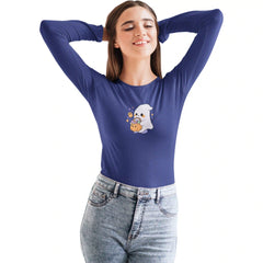 Woman wearing a blue long-sleeve shirt with a ghost and pumpkin design on a white background