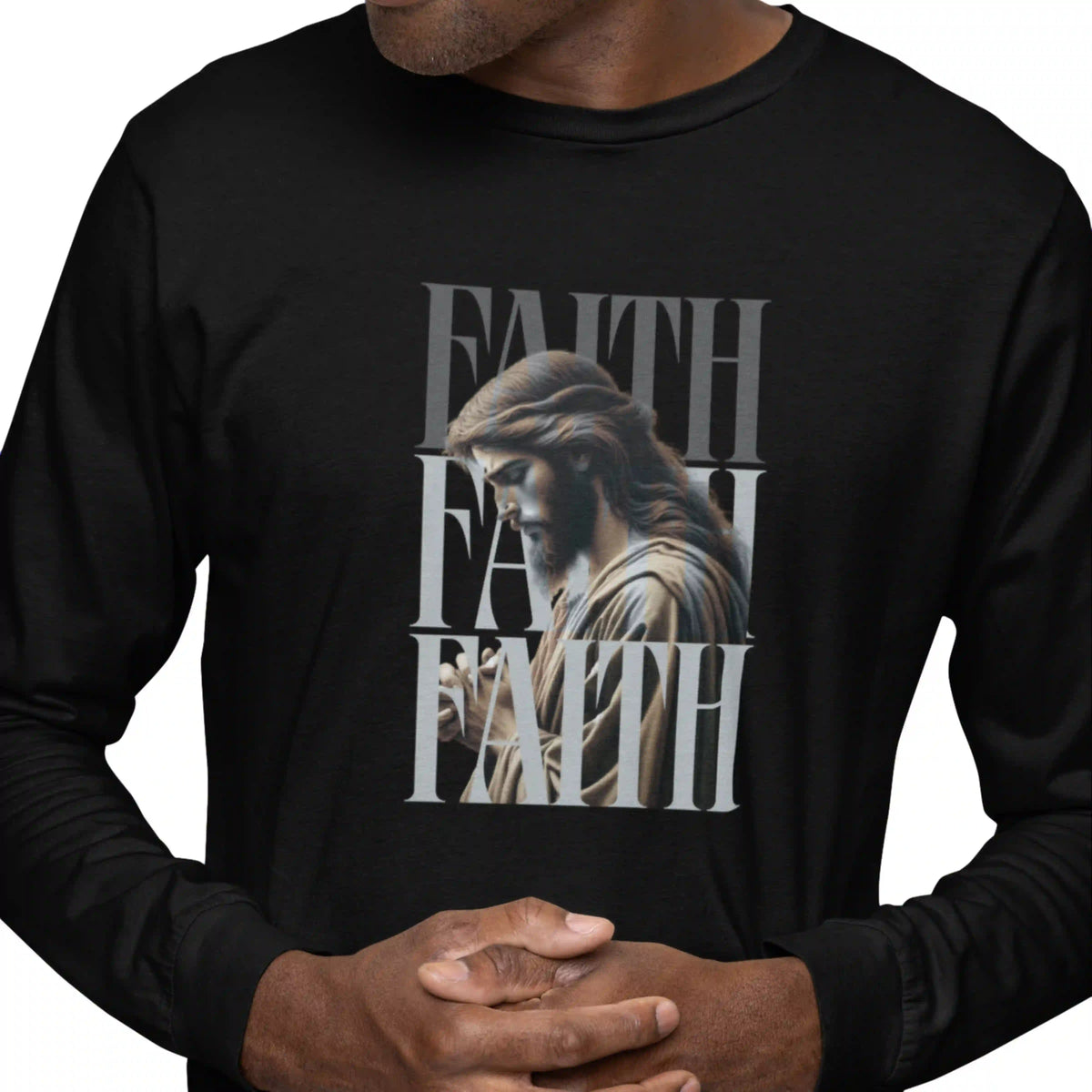 Black long-sleeve shirt with a graphic of a religious figure and 'FAITH' text.