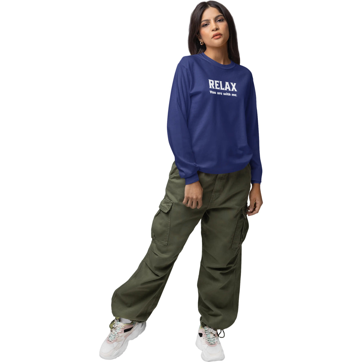 Woman wearing a blue sweatshirt with 'RELAX' text and green cargo pants on a white background