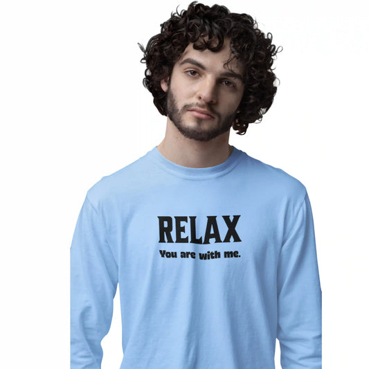 Man wearing a light blue long-sleeve shirt with 'RELAX You are with me.' text on a white background