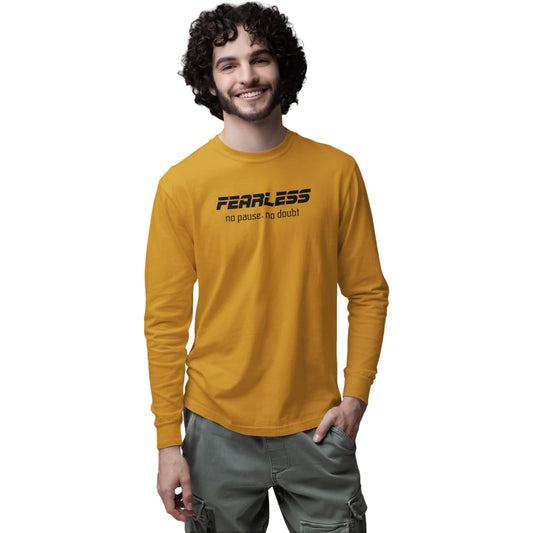 Man wearing a mustard yellow long-sleeve shirt with 'FEARLESS no pause. no doubt.' text on a white background