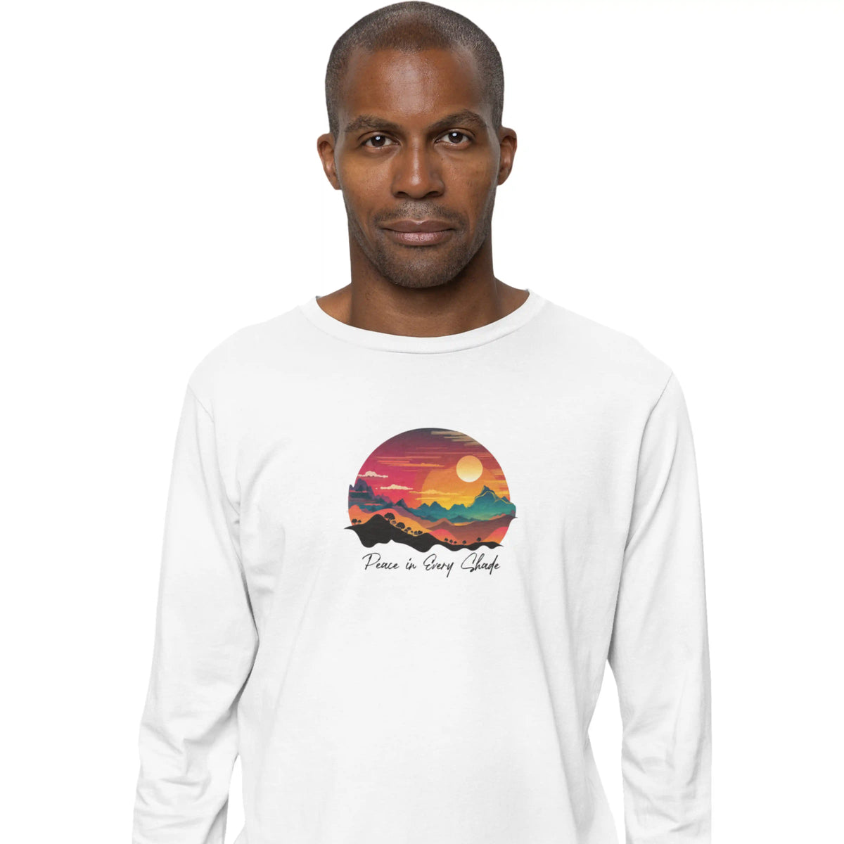 Man wearing a white long-sleeve shirt with a colorful graphic design on a white background