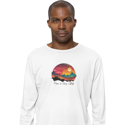 Man wearing a white long-sleeve shirt with a colorful graphic design on a white background