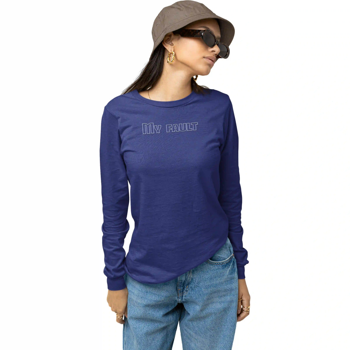 Person wearing a blue long-sleeve shirt with 'My Fault' text, sunglasses, and a hat on a white background