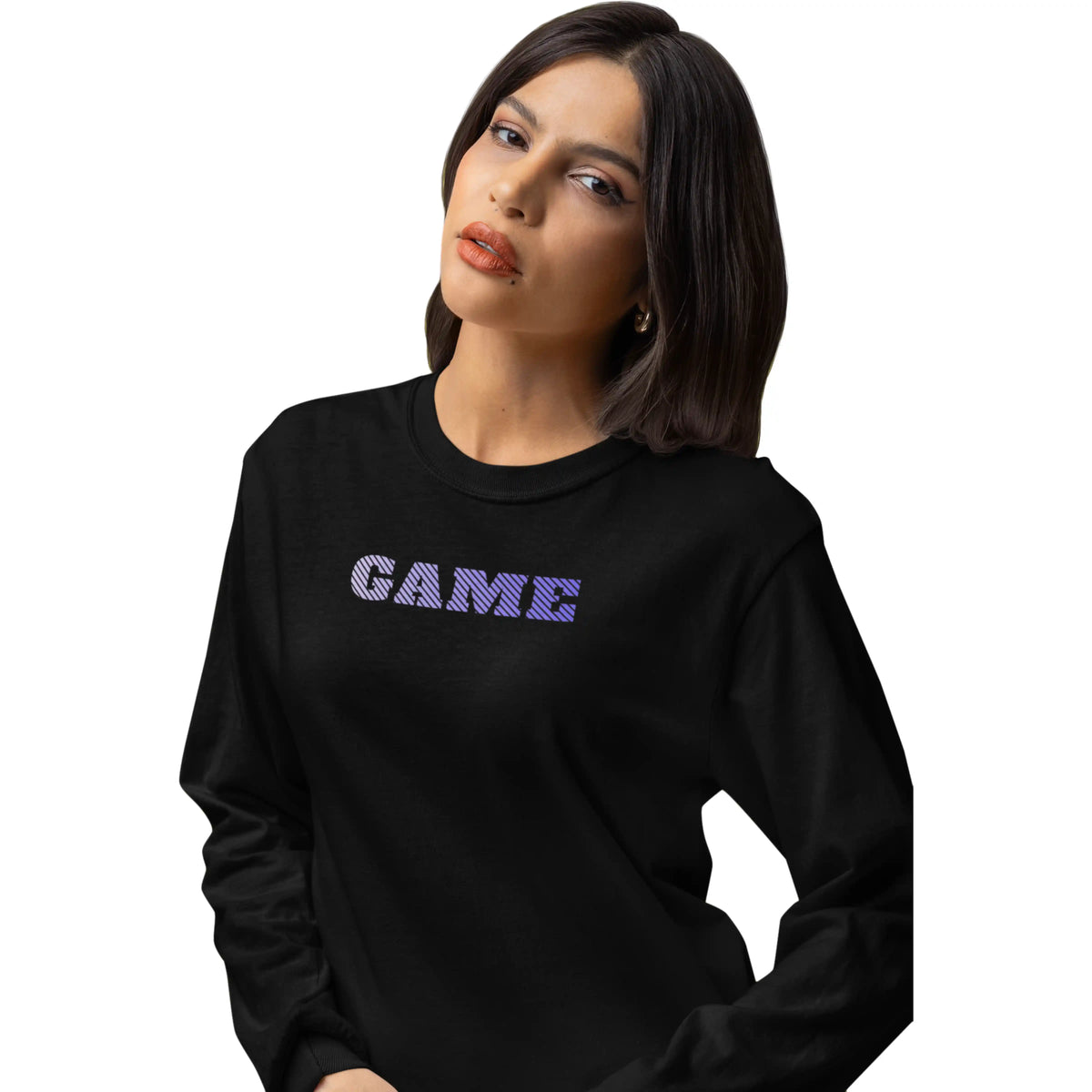 Woman wearing a black sweatshirt with 'GAME' text on a white background