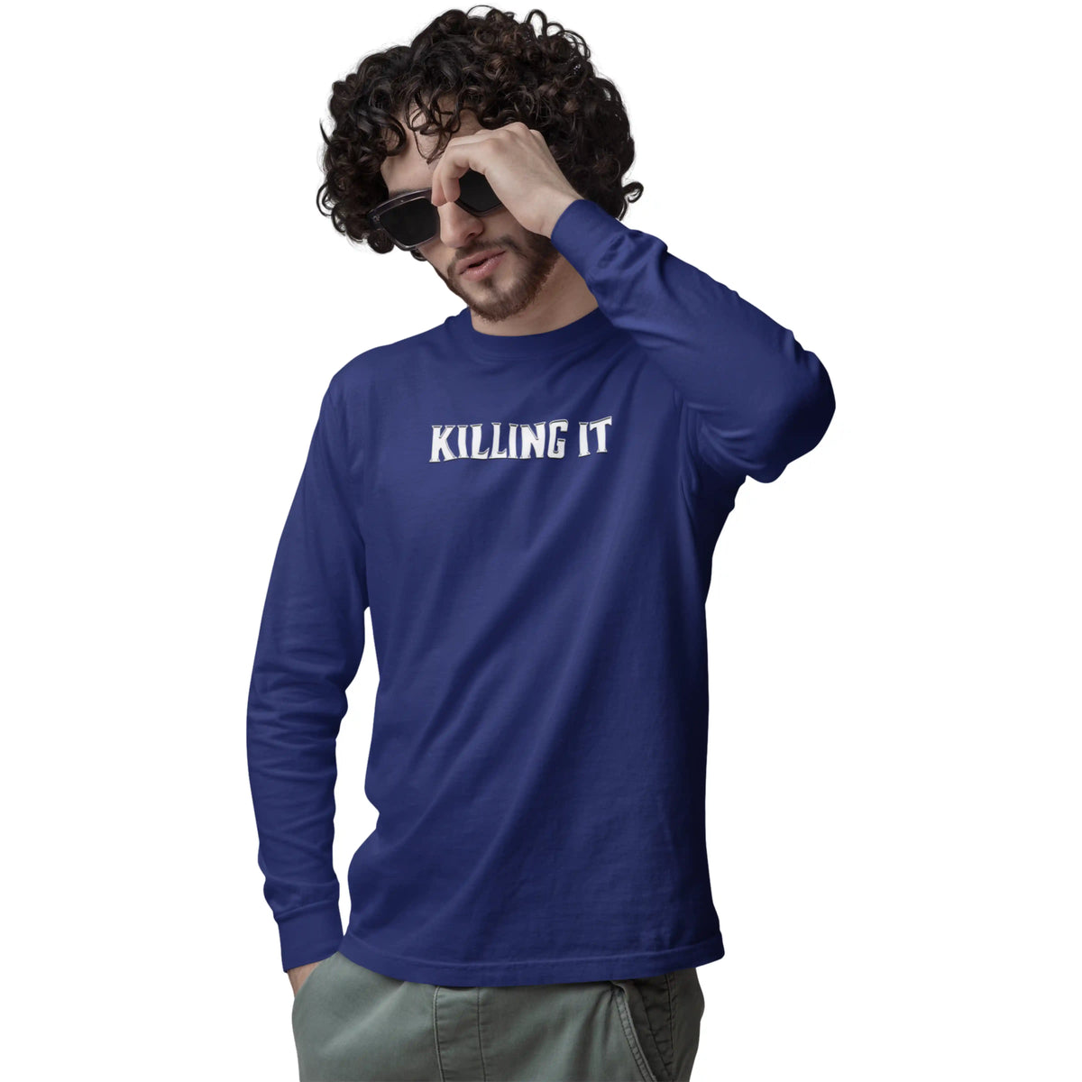 Man wearing a blue long-sleeve shirt with 'KILLING IT' text on a white background
