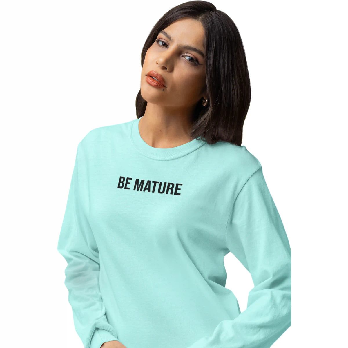 Person wearing a light blue sweatshirt with 'BE MATURE' text on a white background