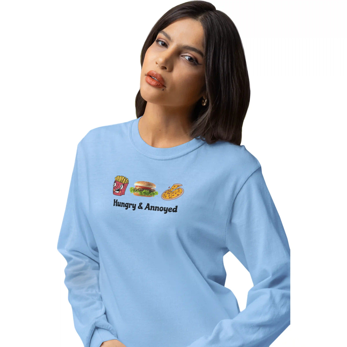 Woman wearing a light blue long-sleeve shirt with food emoji designs and text.