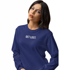 Woman wearing a blue long-sleeve shirt with 'GET LOST.' text on a white background