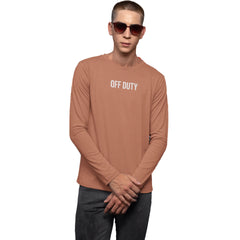 Man wearing a brown long-sleeve shirt with 'OFF DUTY' text on a white background