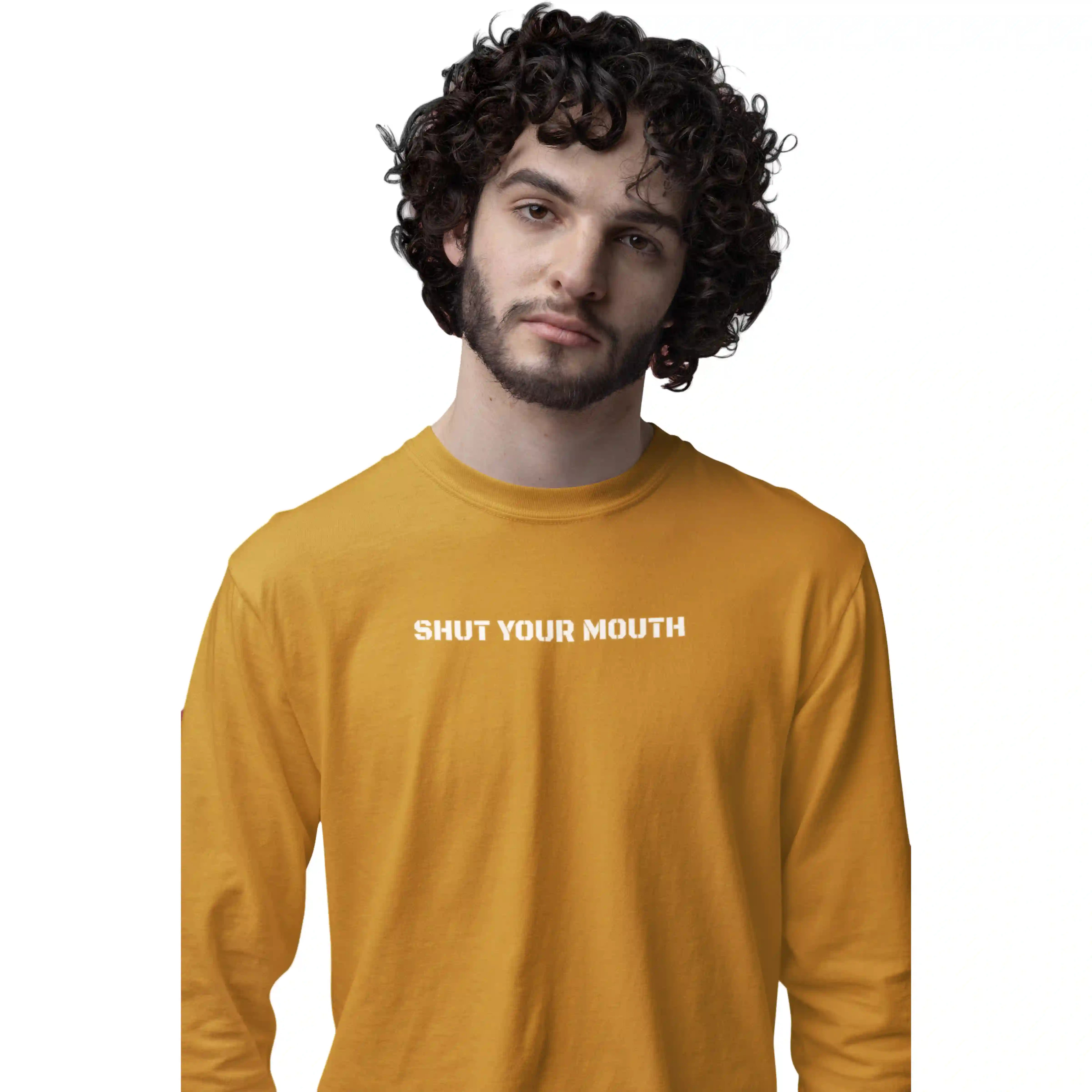 Man wearing a mustard yellow long-sleeve shirt with 'SHUT YOUR MOUTH' text on a white background