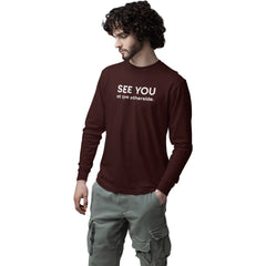 Man wearing a maroon sweatshirt with 'SEE YOU at the otherside.' text on a white background