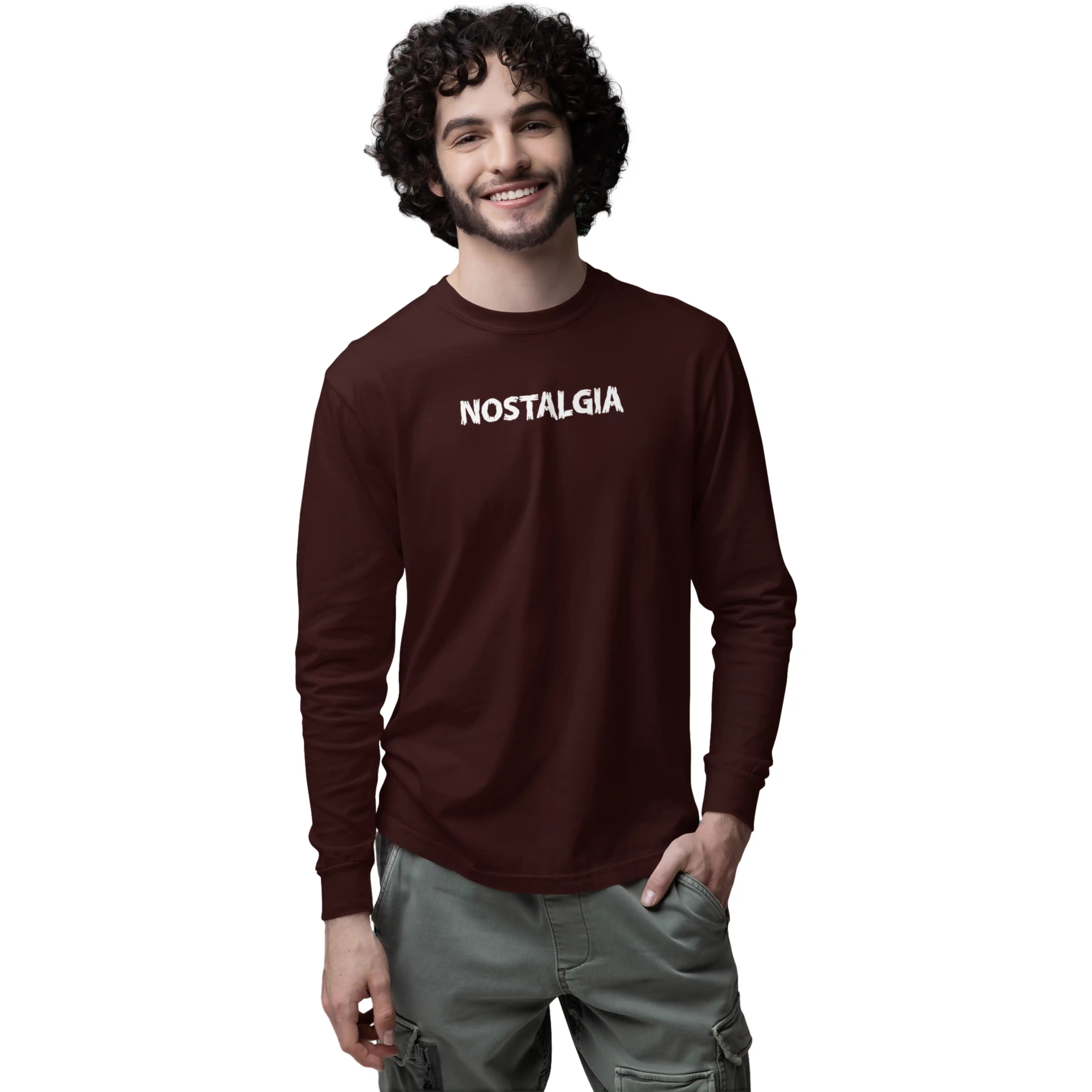 Man wearing a brown long-sleeve shirt with 'FREEDOM' and eagle design on a white background