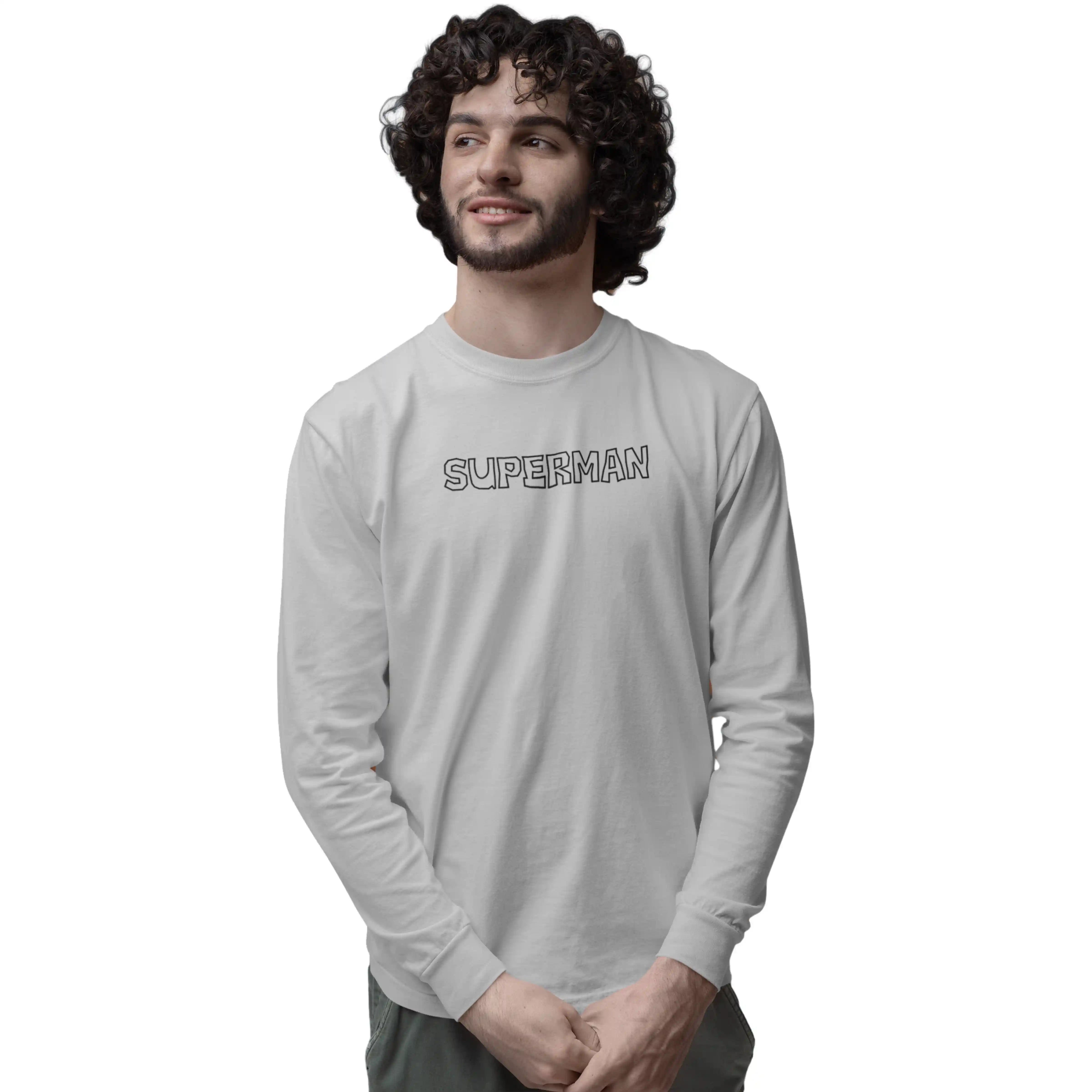 Man wearing a gray long-sleeve shirt with 'Superman' text on a white background