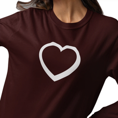 Brown sweatshirt with a white heart design on a plain background