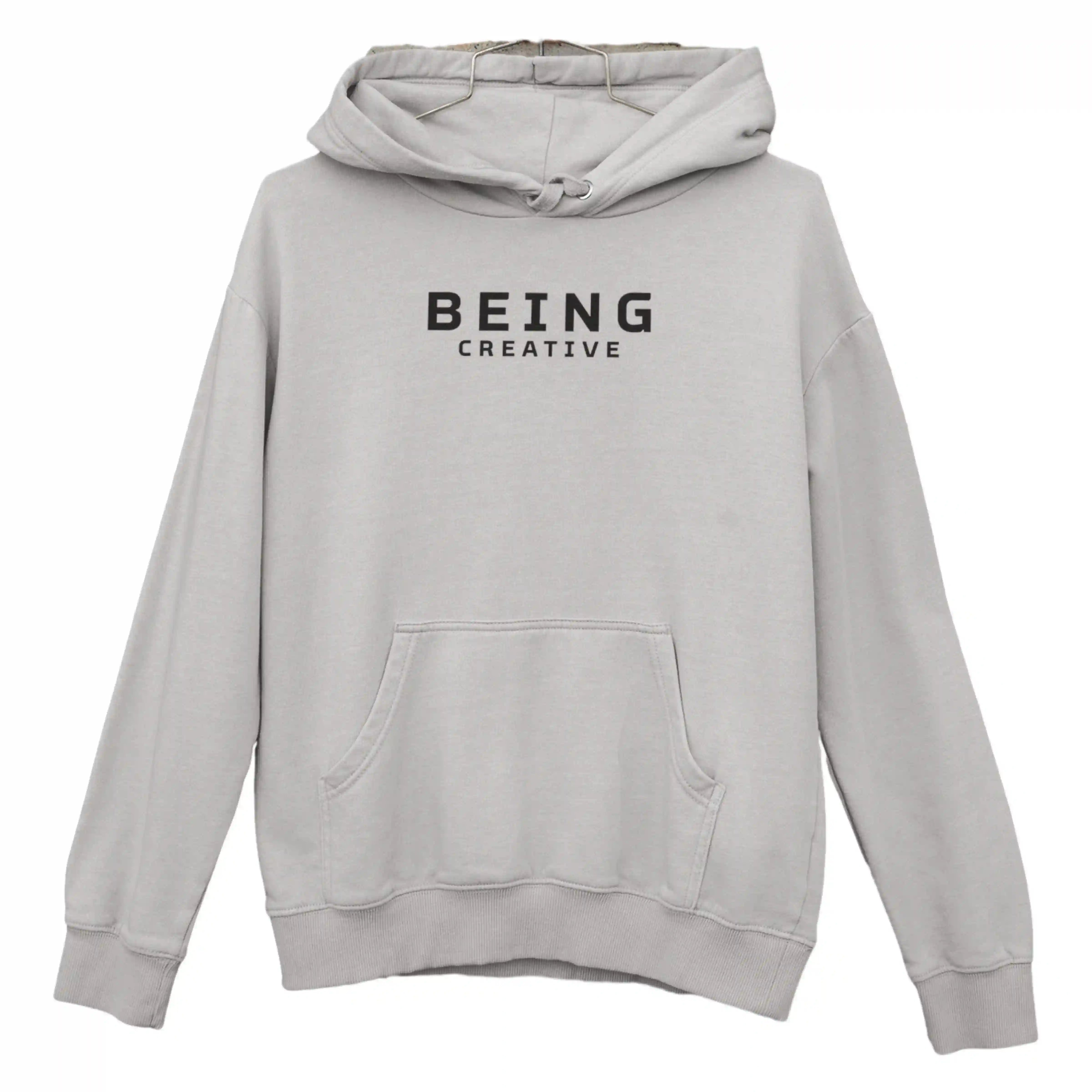 Gray hoodie with 'BEING CREATIVE' text on a white background