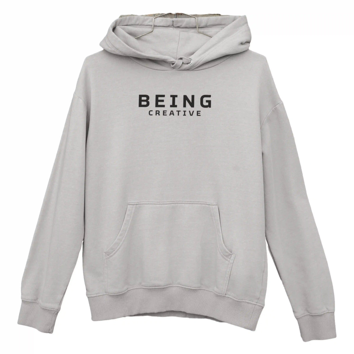 Gray hoodie with 'BEING CREATIVE' text on a white background